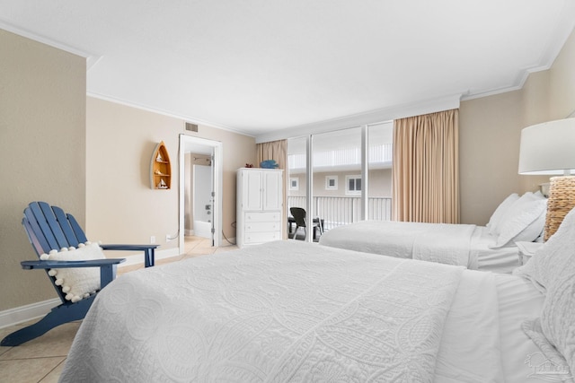 1111 Ft Pickens Rd Unit 111, Pensacola Beach, FL 32561 - bedroom with ornamental molding, light tile patterned floors, and ensuite bath
