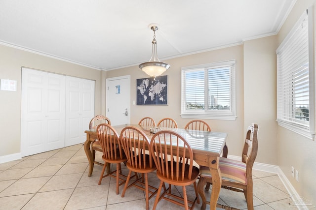 1111 Ft Pickens Rd Unit 111, Pensacola Beach, FL 32561 - dining room featuring light tile patterned floors, crown molding, and plenty of natural light