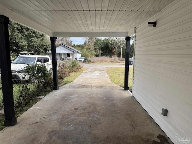 view of patio featuring a carport