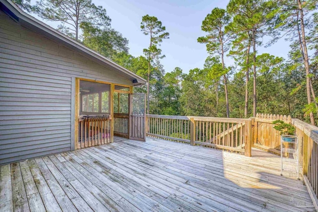 wooden terrace with a sunroom