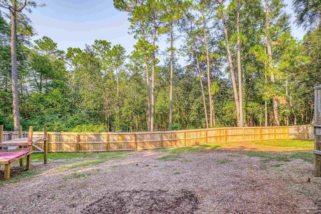 view of yard with fence