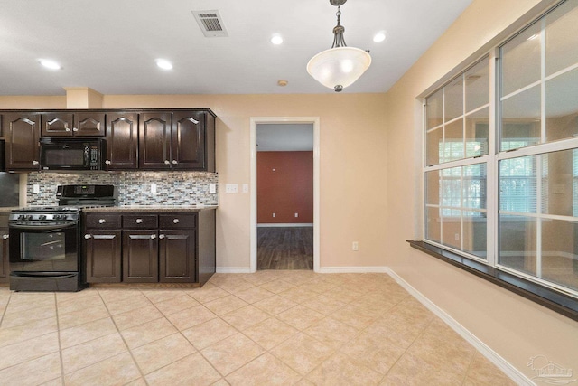 kitchen featuring black appliances, dark brown cabinetry, pendant lighting, and backsplash