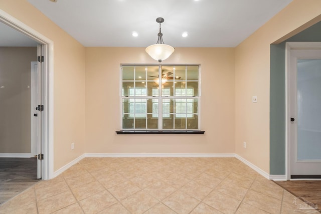 unfurnished dining area featuring light hardwood / wood-style flooring