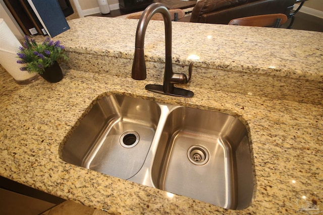 4135 Dundee Crossing Dr, Pace, FL 32571 - kitchen view of a sink and light stone counters