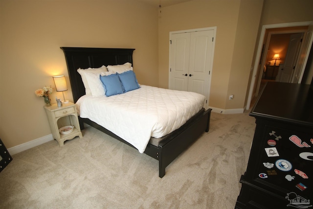 4135 Dundee Crossing Dr, Pace, FL 32571 - bedroom with light colored carpet, a closet, and baseboards