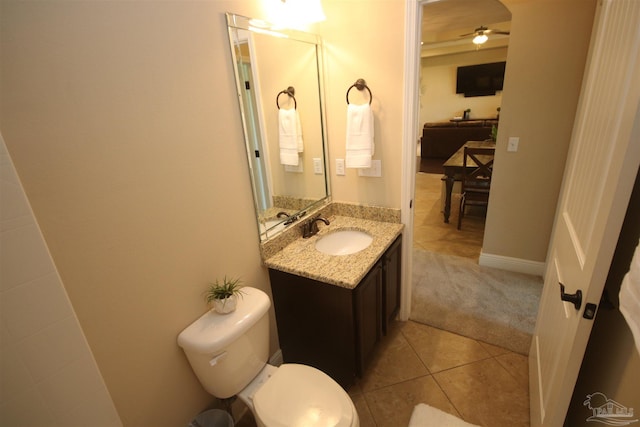4135 Dundee Crossing Dr, Pace, FL 32571 - bathroom with toilet, a ceiling fan, vanity, tile patterned floors, and baseboards