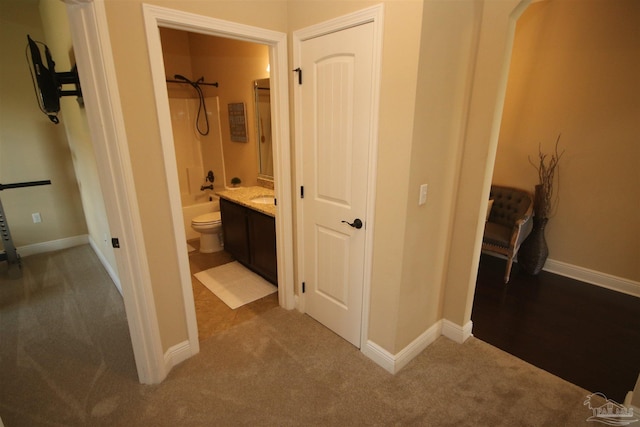 4135 Dundee Crossing Dr, Pace, FL 32571 - hall featuring carpet flooring, baseboards, and a sink
