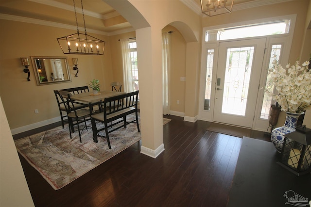 4135 Dundee Crossing Dr, Pace, FL 32571 - entryway featuring arched walkways, a chandelier, crown molding, plenty of natural light, and dark wood-style floors