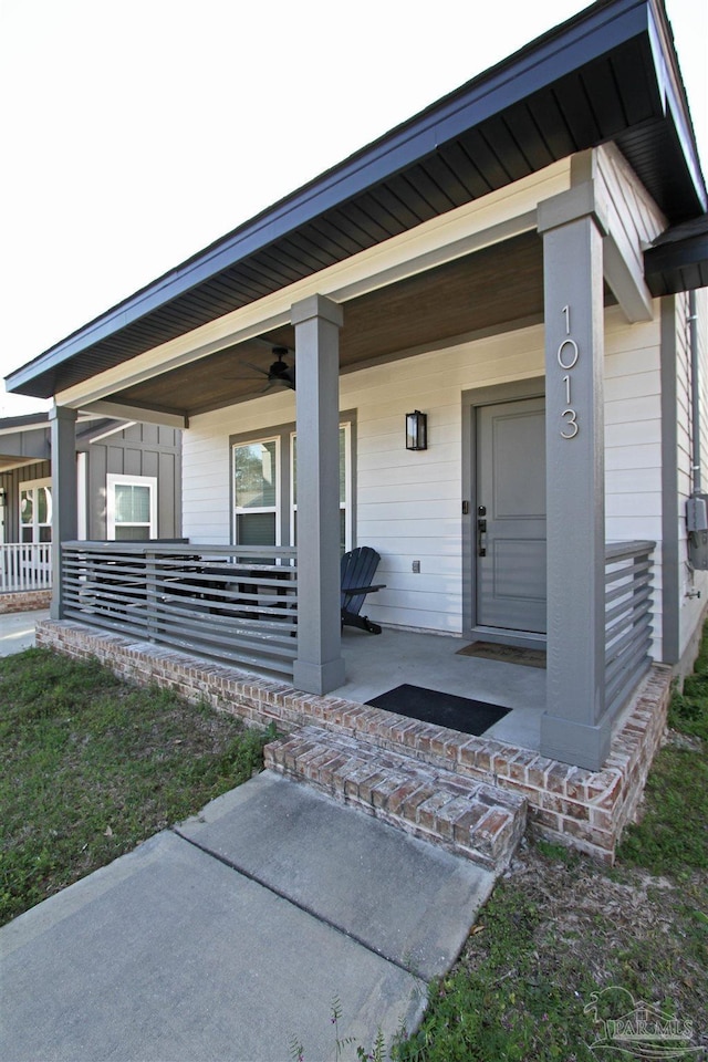 view of exterior entry featuring a porch