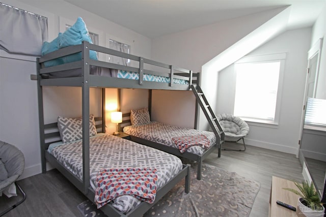 bedroom featuring dark wood-type flooring