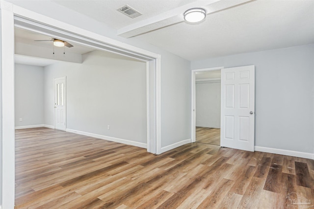808 Woodland Dr, Pensacola, FL 32503 - unfurnished room with baseboards, a ceiling fan, wood finished floors, and visible vents