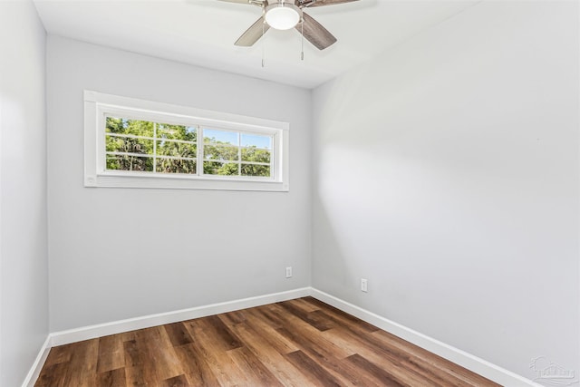 808 Woodland Dr, Pensacola, FL 32503 - unfurnished room with baseboards, dark wood-style floors, and ceiling fan