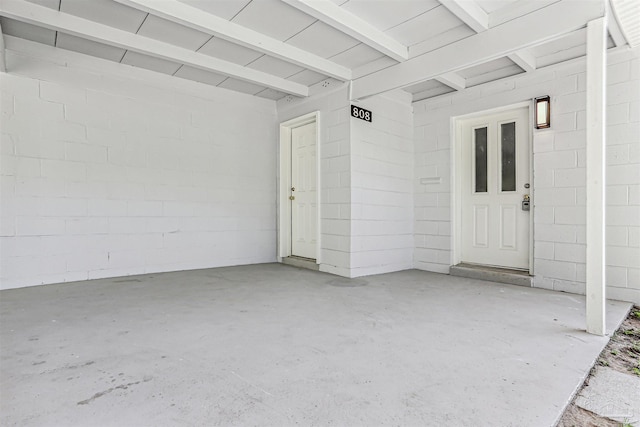 808 Woodland Dr, Pensacola, FL 32503 - garage featuring concrete block wall