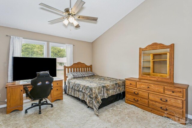 bedroom featuring light carpet, a ceiling fan, and vaulted ceiling