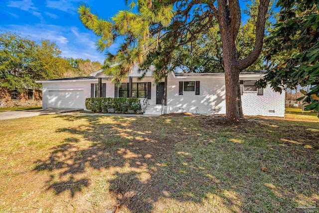 single story home featuring concrete driveway, crawl space, an attached garage, a front lawn, and brick siding