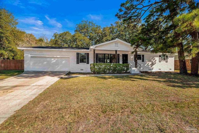 ranch-style home with concrete driveway, crawl space, fence, a garage, and a front lawn