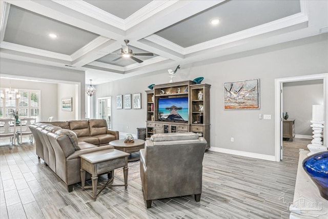 living area with coffered ceiling, baseboards, ceiling fan with notable chandelier, beamed ceiling, and light wood-type flooring