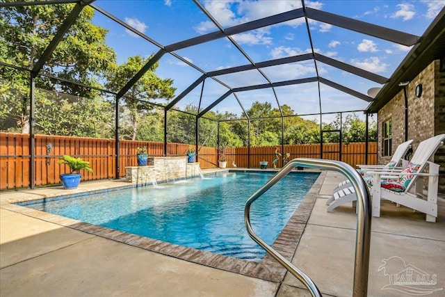 view of pool with a patio, a lanai, a fenced in pool, and a fenced backyard