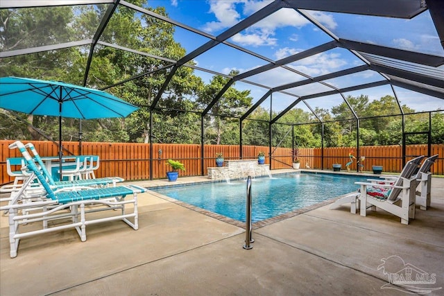 view of pool with a fenced backyard, a lanai, a patio, and a fenced in pool