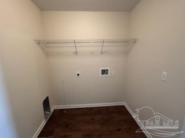 laundry area with washer hookup, laundry area, electric dryer hookup, dark wood finished floors, and baseboards