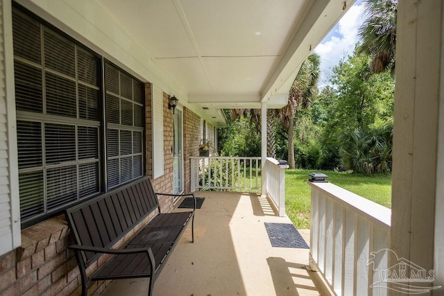 view of patio featuring a porch