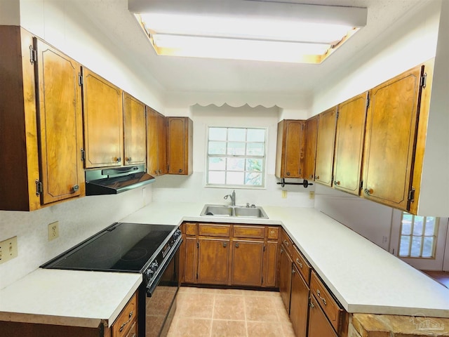 kitchen with black range with electric stovetop, light tile patterned floors, sink, and kitchen peninsula