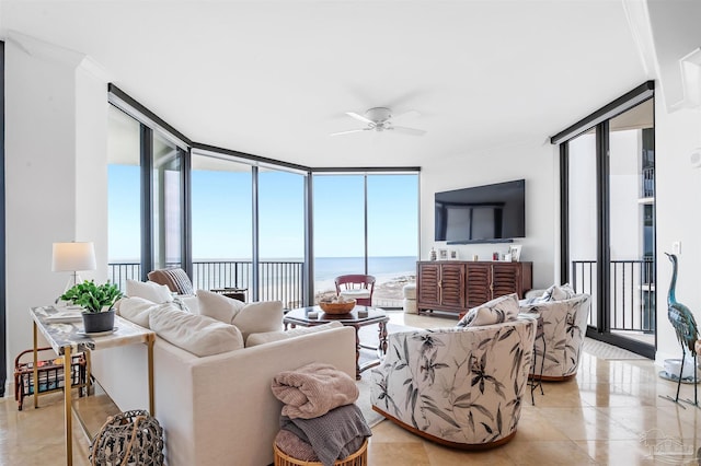 living area featuring a wall of windows, light tile patterned flooring, and a ceiling fan