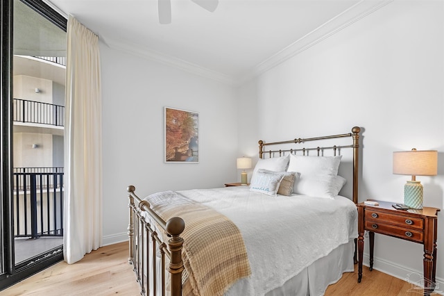 bedroom with baseboards, access to outside, ornamental molding, ceiling fan, and light wood-style floors