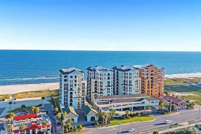 aerial view with a beach view and a water view