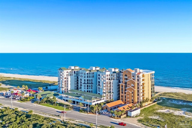 aerial view featuring a water view and a view of the beach