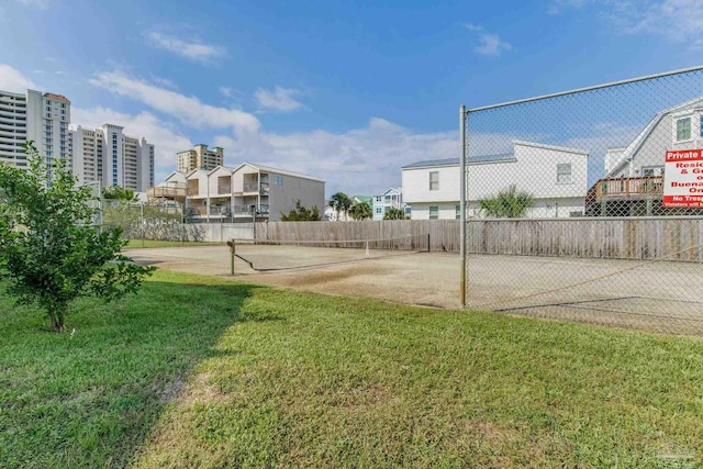 exterior space with tennis court