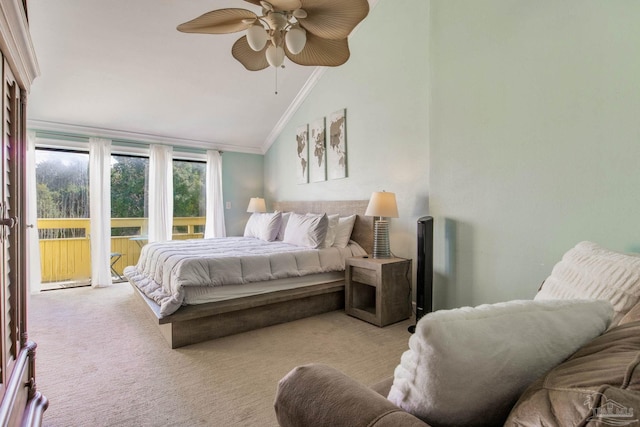 carpeted bedroom with lofted ceiling, ceiling fan, and crown molding