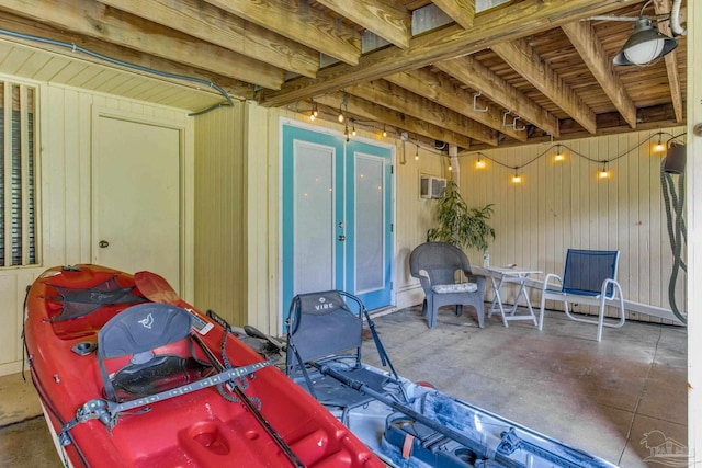 view of patio with a wall mounted AC