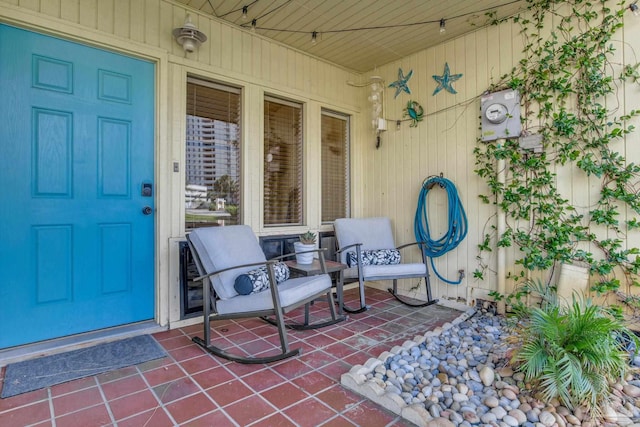 doorway to property with a porch