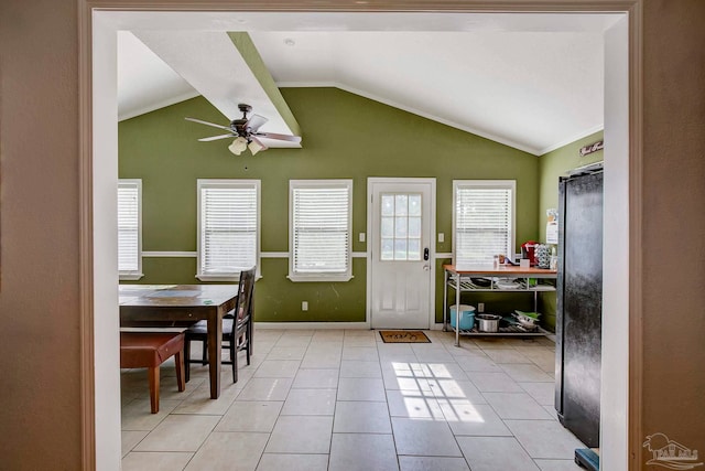 14574 N County Rd 65, Foley, AL 36535 - foyer entrance featuring lofted ceiling, a ceiling fan, light tile patterned floors, and baseboards
