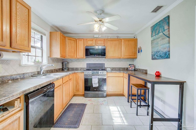 14574 N County Rd 65, Foley, AL 36535 - kitchen featuring appliances with stainless steel finishes, a sink, crown molding, tasteful backsplash, and light brown cabinets