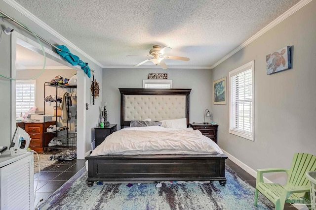 14574 N County Rd 65, Foley, AL 36535 - bedroom with a textured ceiling, crown molding, ceiling fan, and a closet