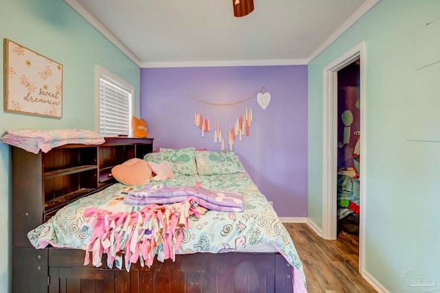 14574 N County Rd 65, Foley, AL 36535 - bedroom featuring ornamental molding, wood finished floors, baseboards, and a ceiling fan