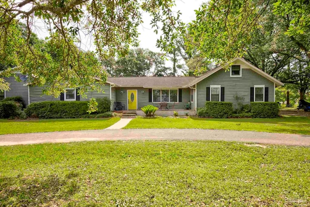 14574 N County Rd 65, Foley, AL 36535 - ranch-style house featuring a front lawn