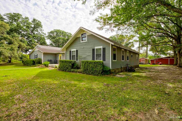 14574 N County Rd 65, Foley, AL 36535 - view of home's exterior with a lawn