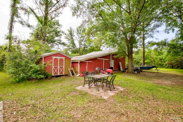 14574 N County Rd 65, Foley, AL 36535 - view of grassy yard with an outbuilding