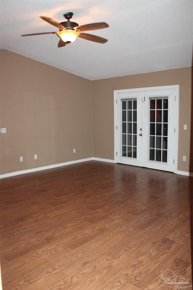 unfurnished room with french doors, hardwood / wood-style floors, and ceiling fan