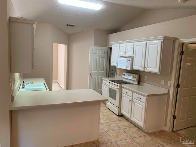 kitchen featuring white appliances, kitchen peninsula, sink, and white cabinets