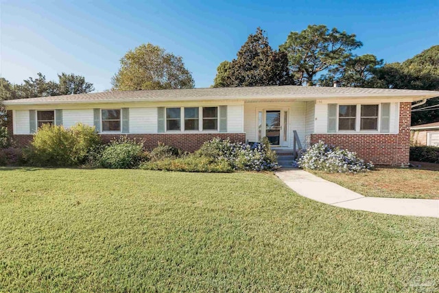 ranch-style house with a front yard