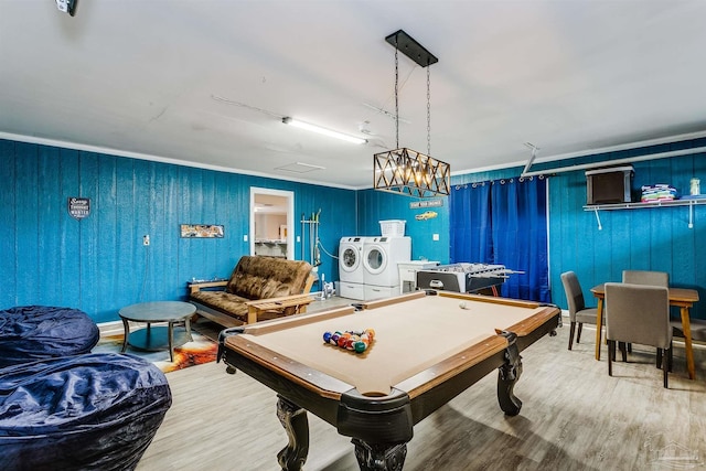 game room with separate washer and dryer, hardwood / wood-style flooring, and pool table