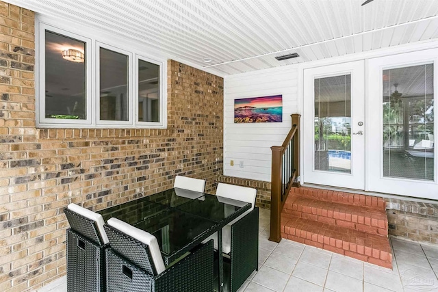 view of patio featuring french doors