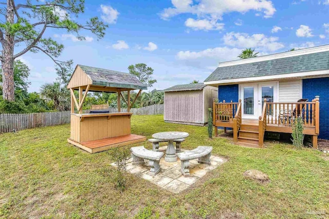 view of yard featuring a wooden deck