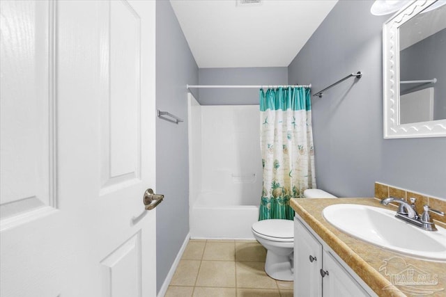 full bathroom featuring tile patterned flooring, vanity, toilet, and shower / tub combo