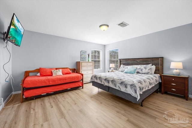 bedroom featuring light wood-type flooring