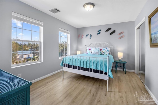 bedroom featuring light wood-type flooring